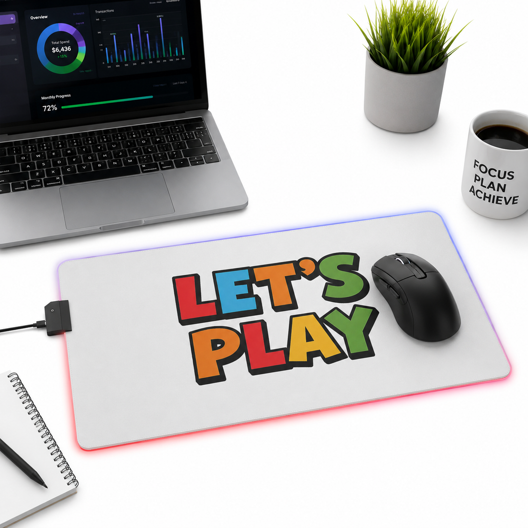 Rectangular LED gaming mouse pad shown with colorful RGB lighting around the edges for gaming, streaming and office desk use.

