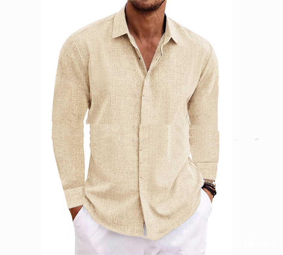 Man wearing a beige linen shirt and white pants on a white background