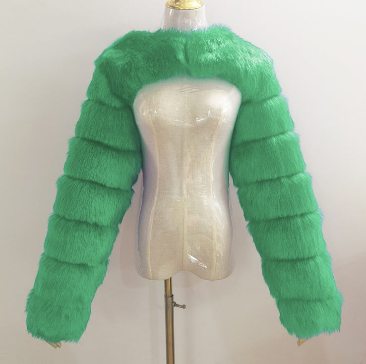 Open-front faux fur bolero on dress form
