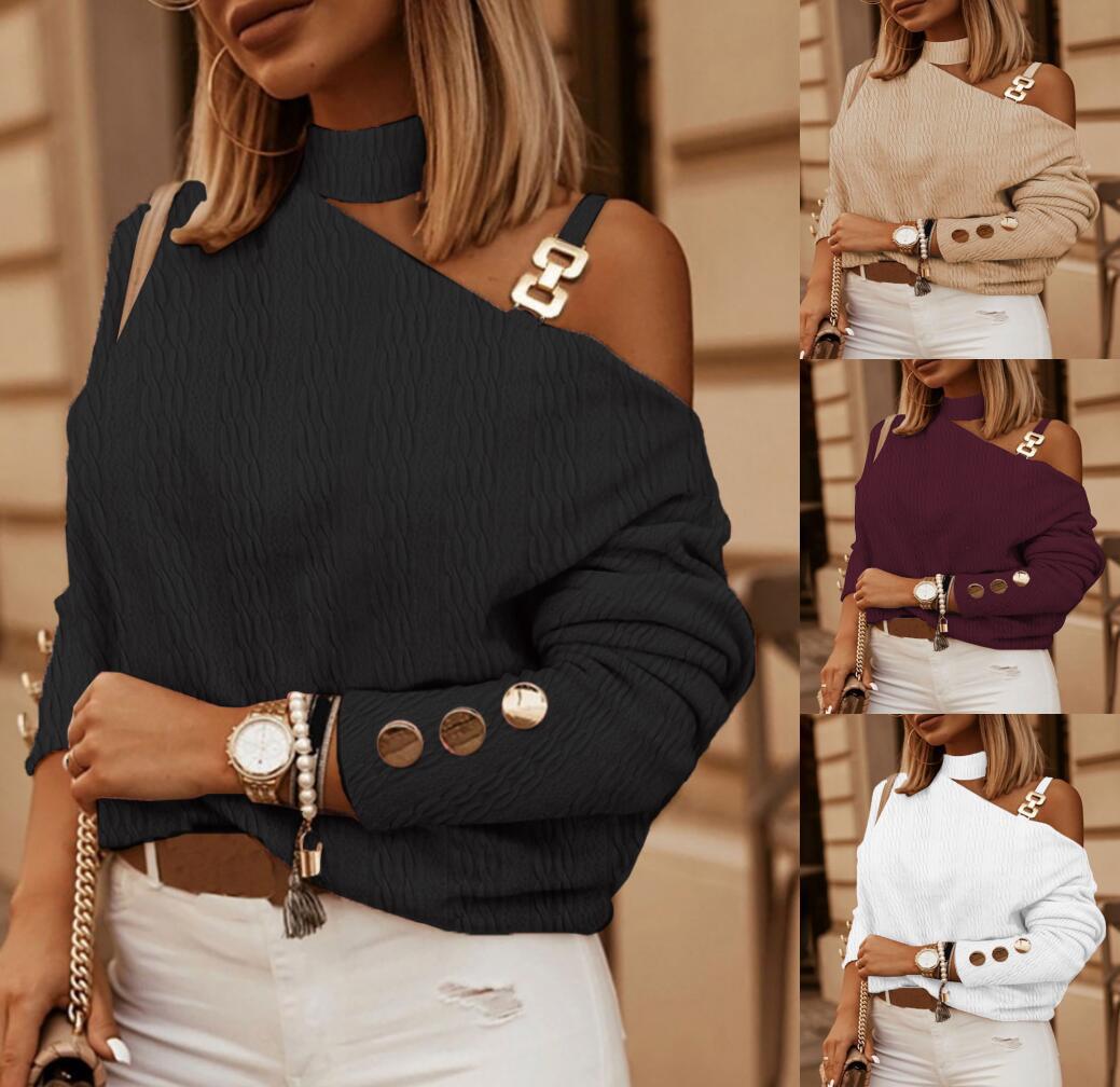 womens oblique shoulder chain top white polyester embossed texture styled with tailored pants