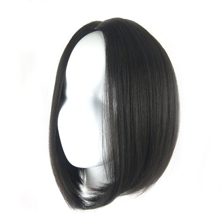Side angle of black bob wig with natural shine and face-framing short silhouette