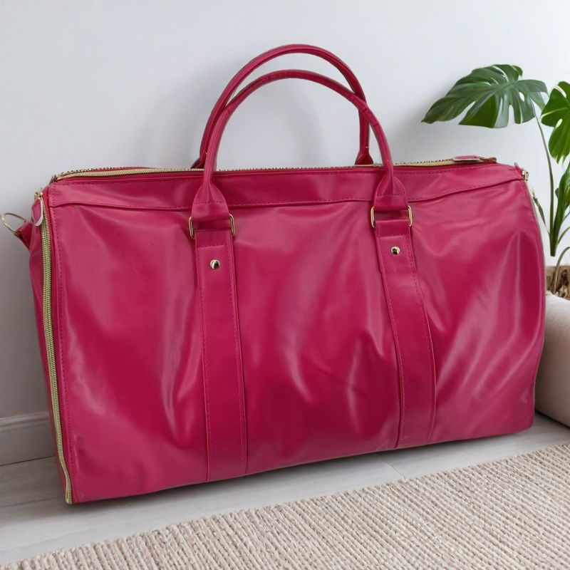 Crossbody travel bag with adjustable strap, zipper closure and interior compartments for business use and organized carrying.
