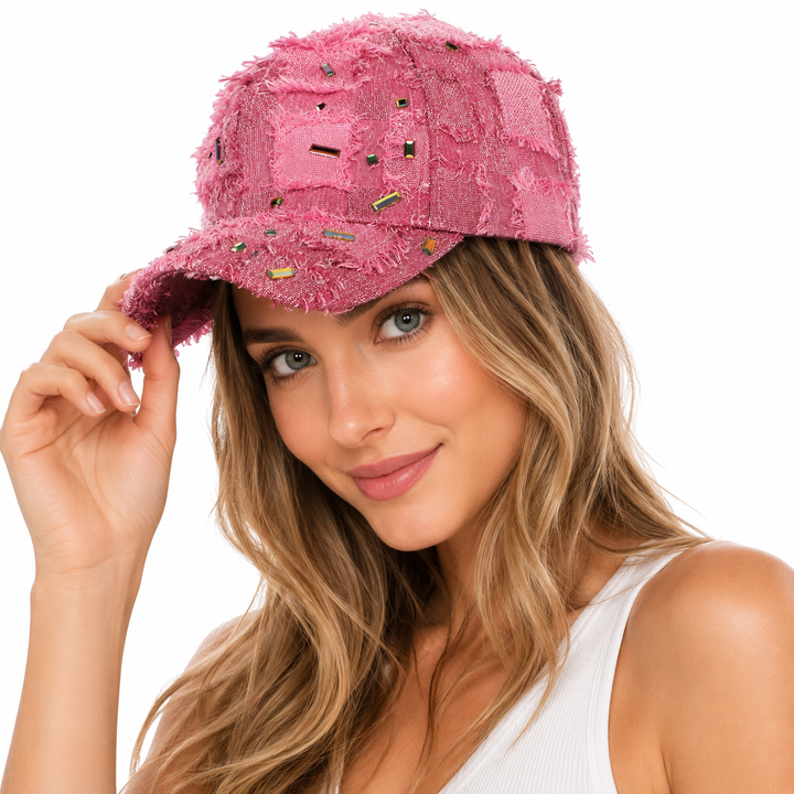 Vintage streetwear baseball cap featuring distressed texture, fringe detail and diamond accents for hip-hop inspired styling.
