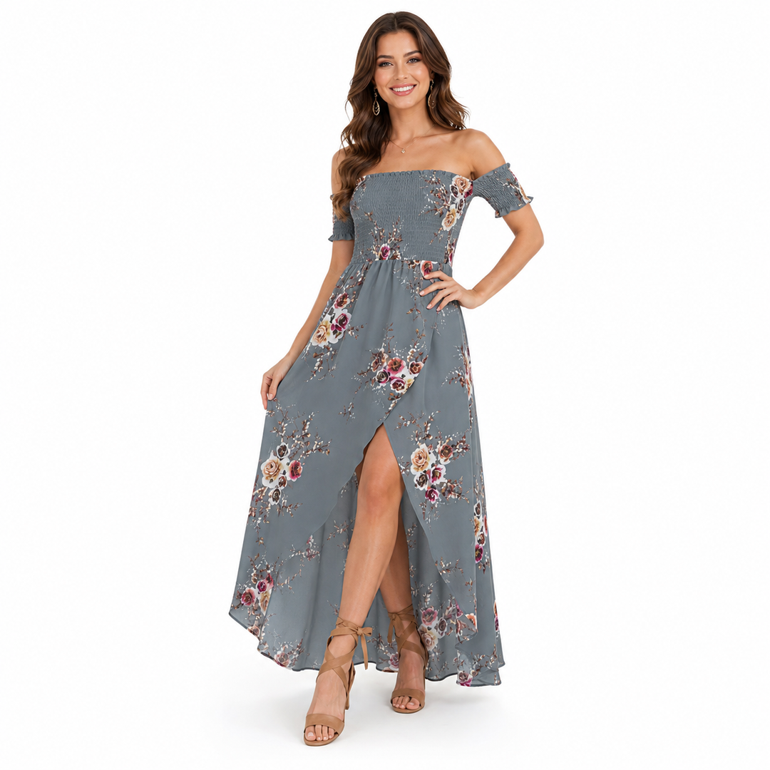 Woman wearing a gray floral off-shoulder dress on a white background