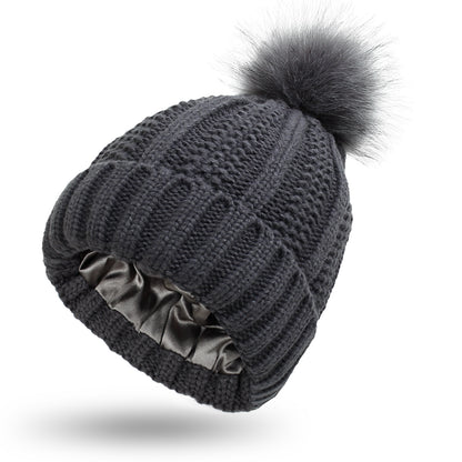 Classic black satin lined beanie for women, minimal design with soft knit texture and anti frizz interior for daily wear