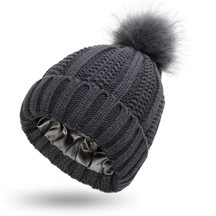 Classic black satin lined beanie for women, minimal design with soft knit texture and anti frizz interior for daily wear