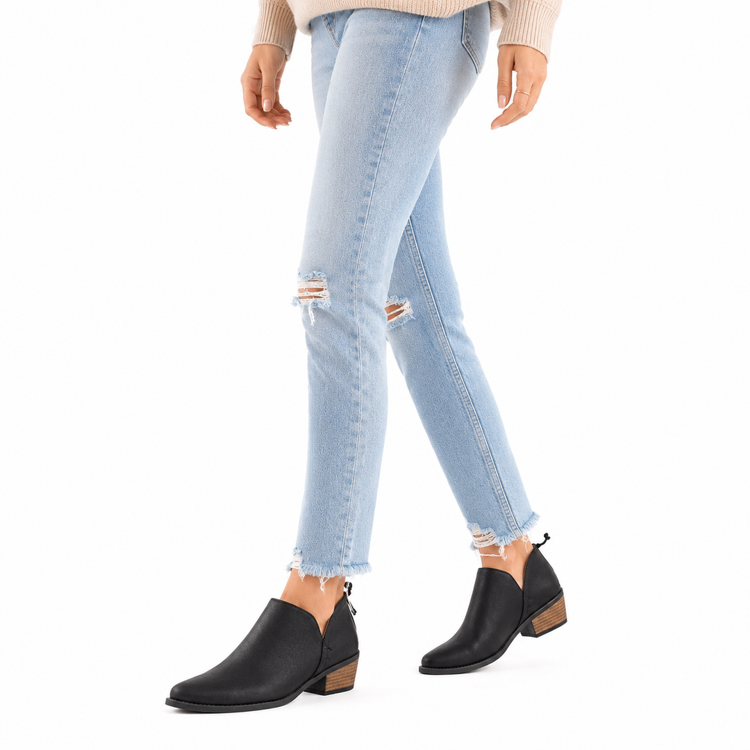 Soft faux suede boots with stable high heel, rubber sole, and polished profile