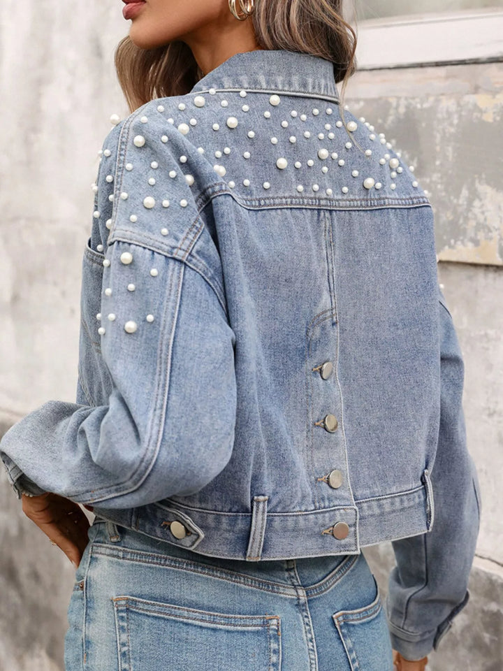 luxury cropped denim jacket textured fabric smooth hand feel close-up