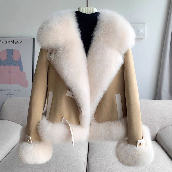 luxury looking faux fur coat apricot worn casually with cashmere sweater
