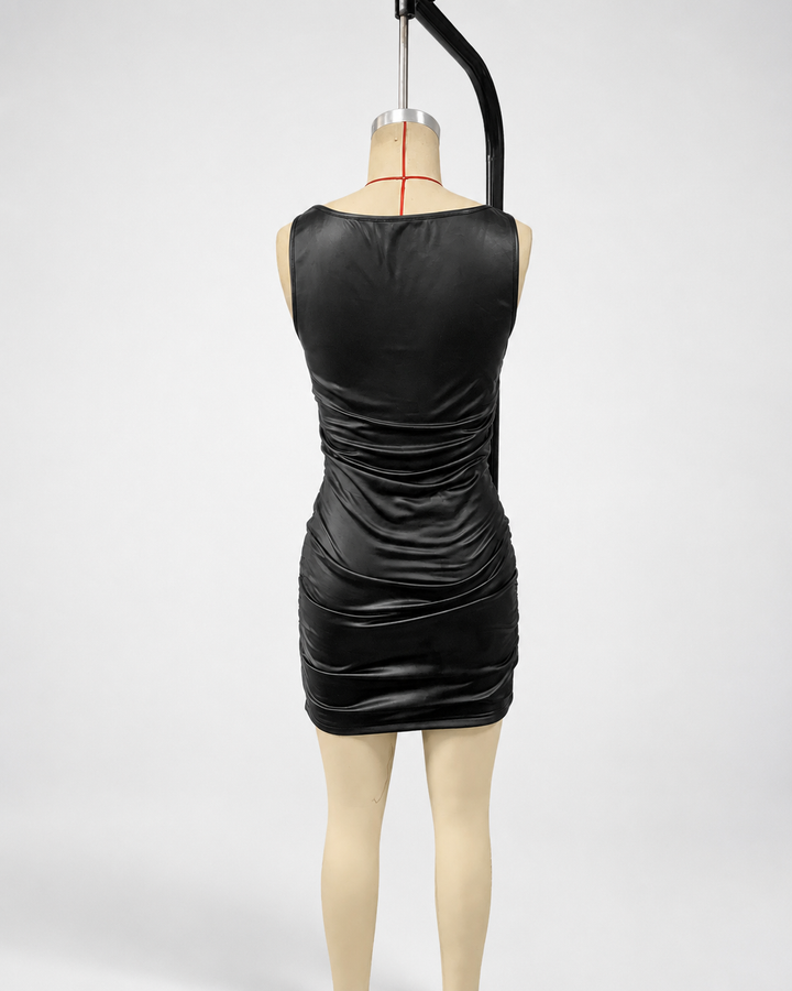 Black faux-leather mini dress with scoop neckline, bodycon shape, and polished studio product view