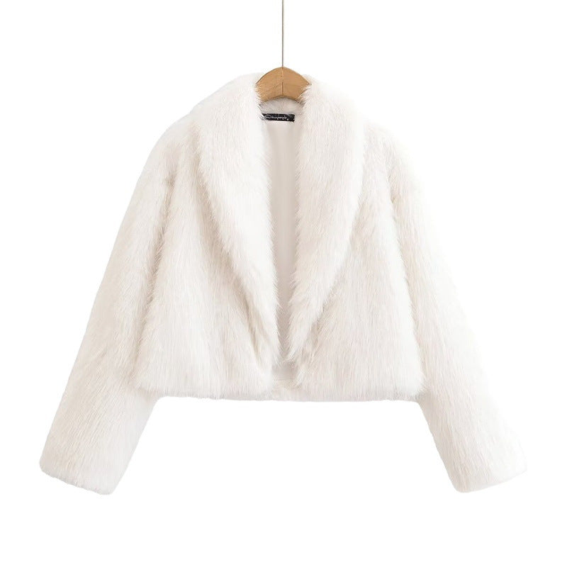 Front view of the white lapel jacket on a wooden hanger with its fuzzy surface, long sleeves and open neckline fully visible.