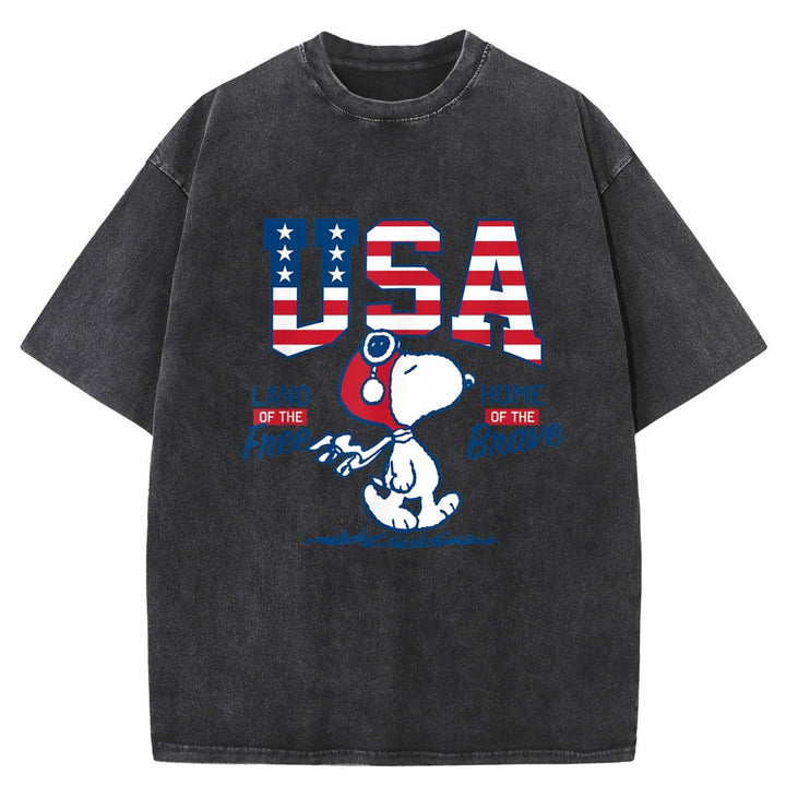A dark gray mineral-wash t-shirt featuring a patriotic graphic of Snoopy and USA with red, white, and blue colors.