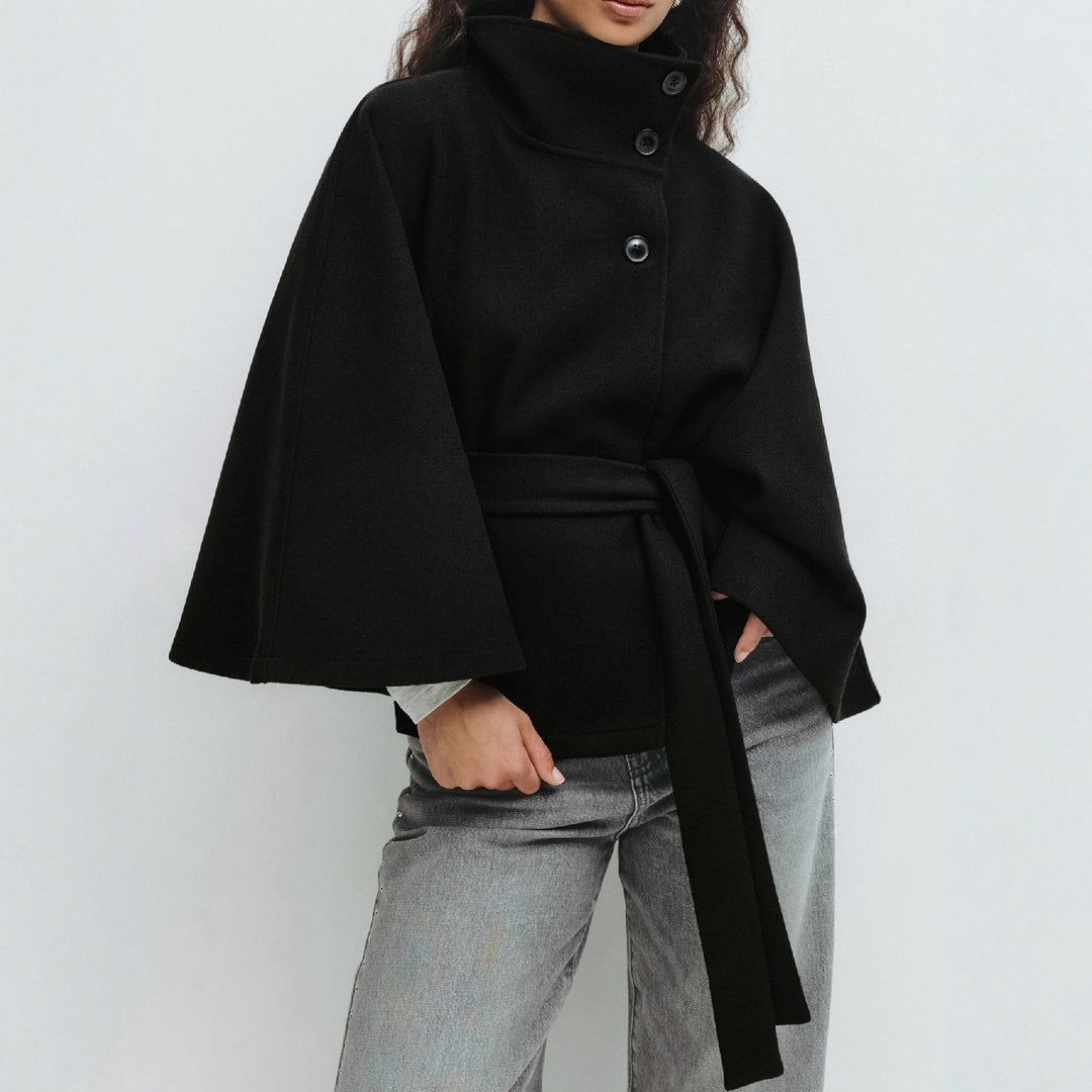 "polyester trench coat women double pocket design stand collar black shade ideal for commute and travel days"