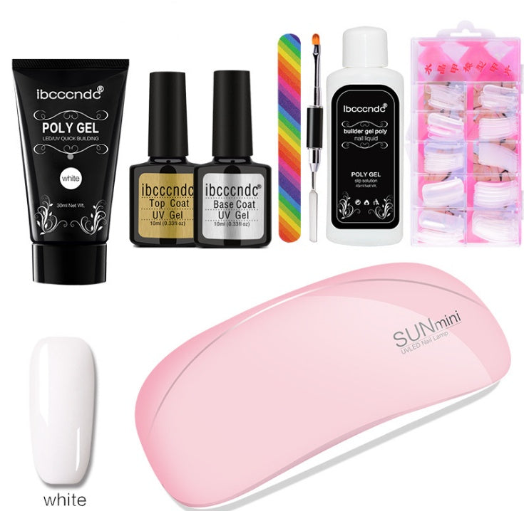 Collection of nail care products including gel bottles, a lamp, and a box on a white background