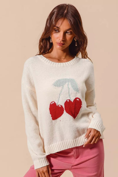 Heart knit sweater ribbed texture close up showing soft polyester finish