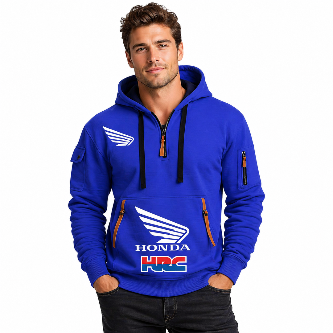 Model in biker hoodie men’s style standing in a relaxed pose on a white background