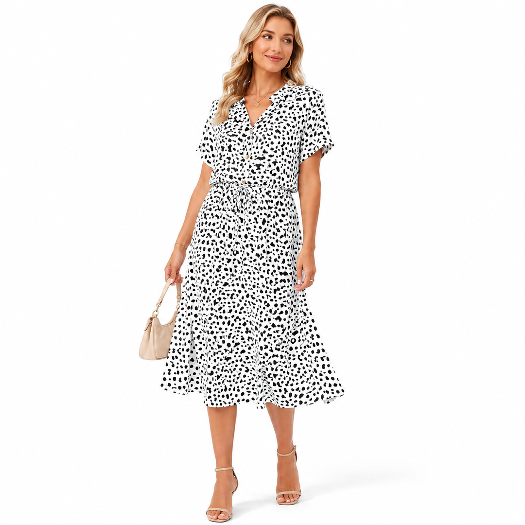 Polka dot chiffon dress with high waist, shirt collar and light summer drape for elegant warm weather outfit styling online..
