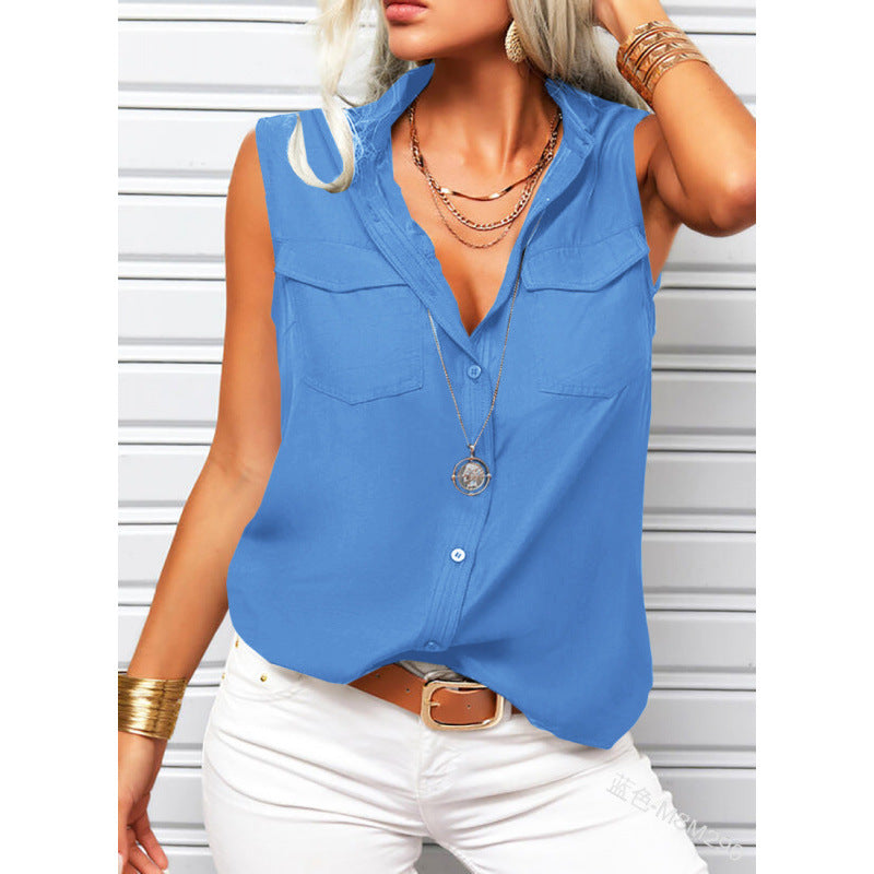 Woman wearing a blue sleeveless shirt with white pants against a white background