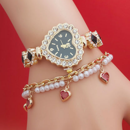 Black dial heart bracelet watch for women with sparkling stones and gold link strap, chic romantic heart watch bracelet