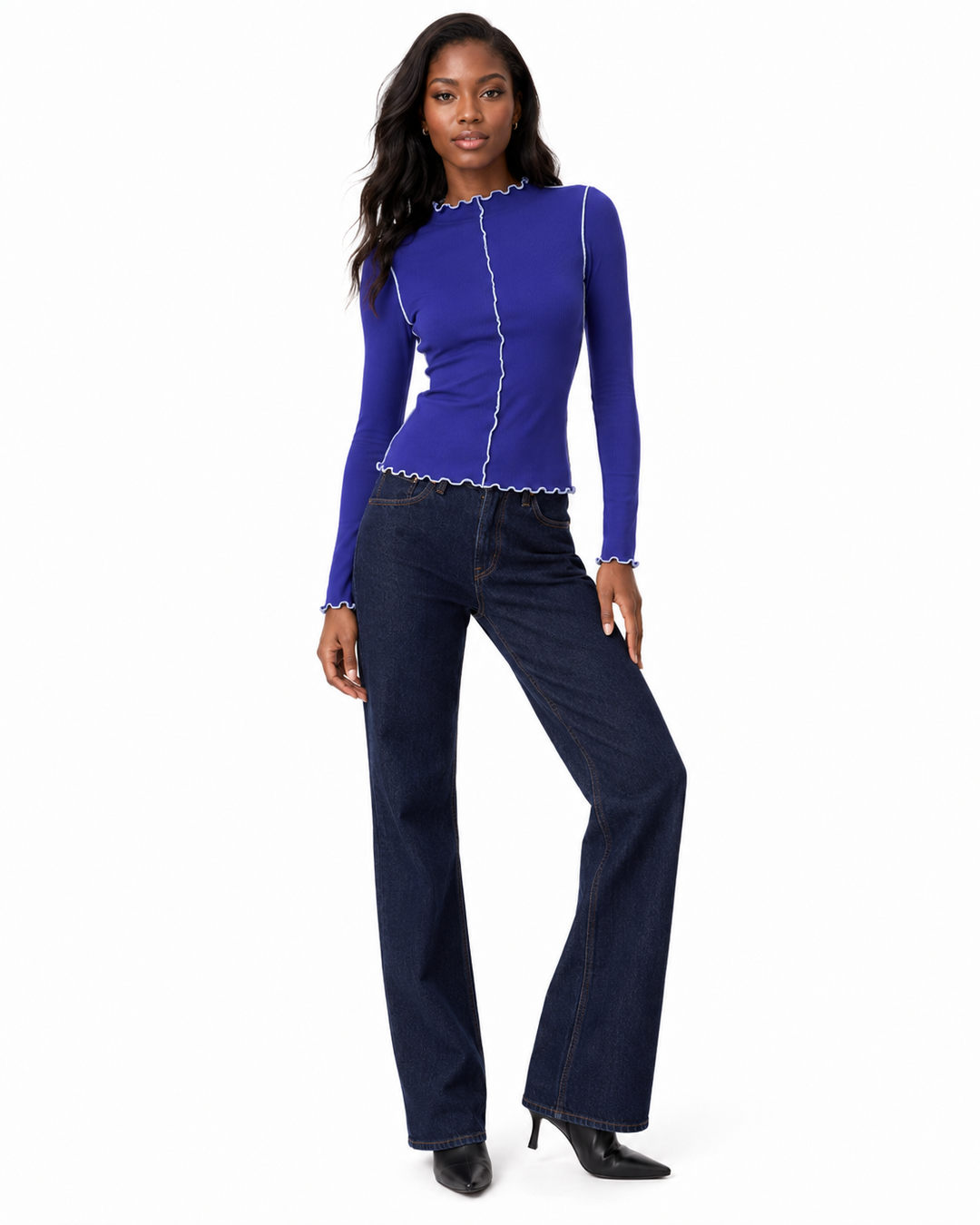 Close view of the mock neckline with wavy lettuce trim on a women&