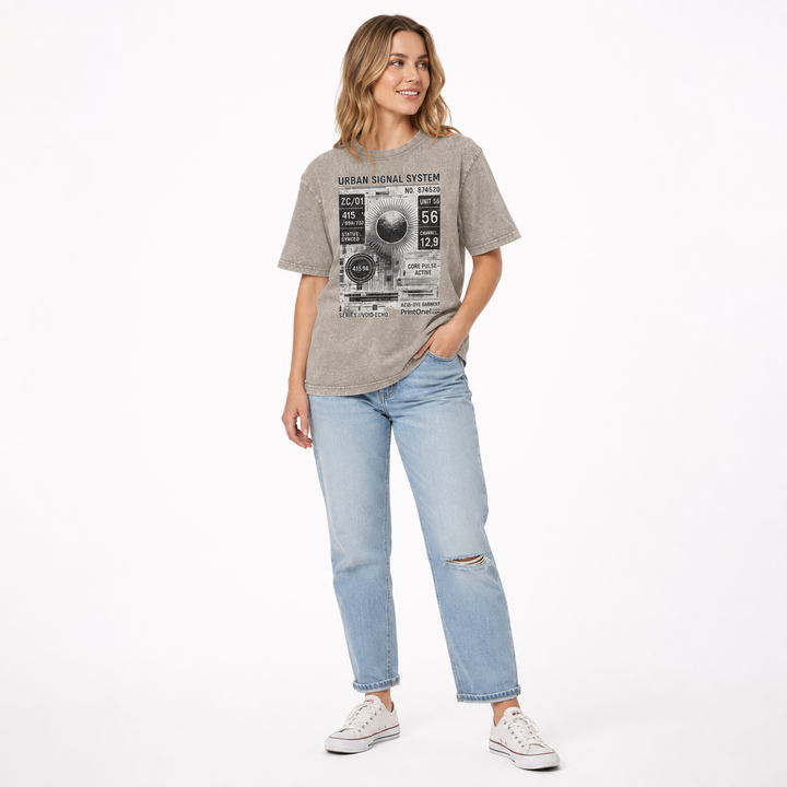 Three-quarter view of a woman wearing the dark khaki vintage graphic T shirt with acid wash texture and relaxed fit.