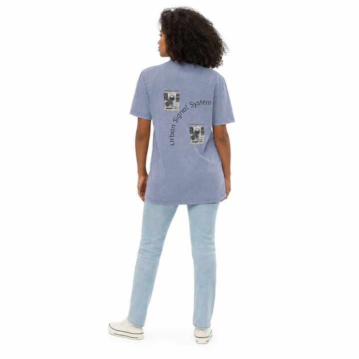 Back view of a woman wearing the vintage blue graphic streetwear T shirt with Urban Signal System back print.