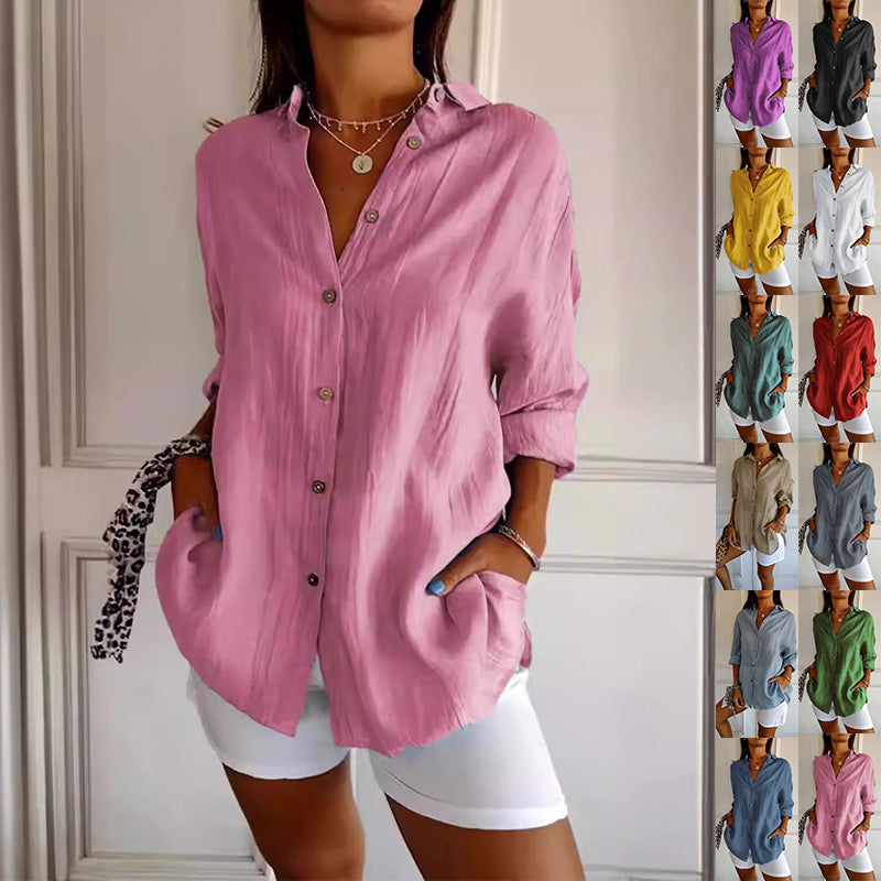 long pleated shirt relaxed fit shown untucked over jeans with lapel neckline and single-breasted button front
