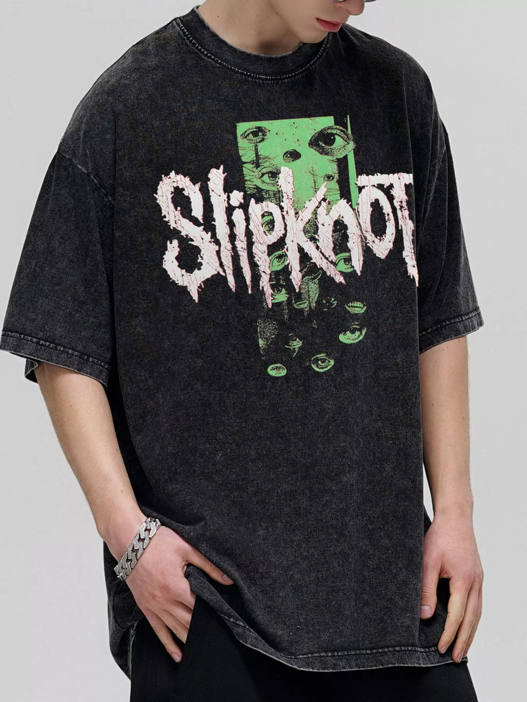 vintage wash T-shirt men styling with cargo pants and sneakers casual outfit context