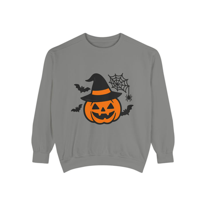 Pumpkin sweatshirt with witch hat, bats and spider web graphic shown on a model for the clean Halloween outfit product image.