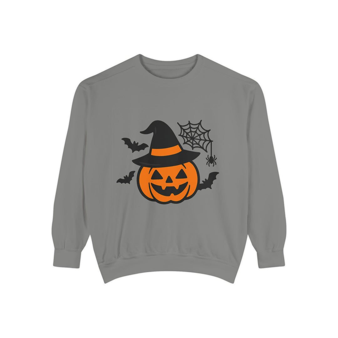 Detail view of Halloween graphic with pumpkin, witch hat, bats and spider web elements on the sweatshirt front design detail.