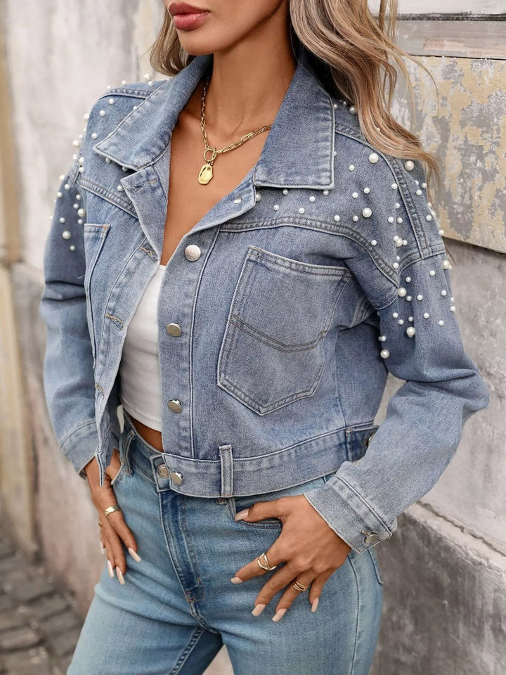 luxury cropped denim jacket styled with high-waist trousers city lifestyle