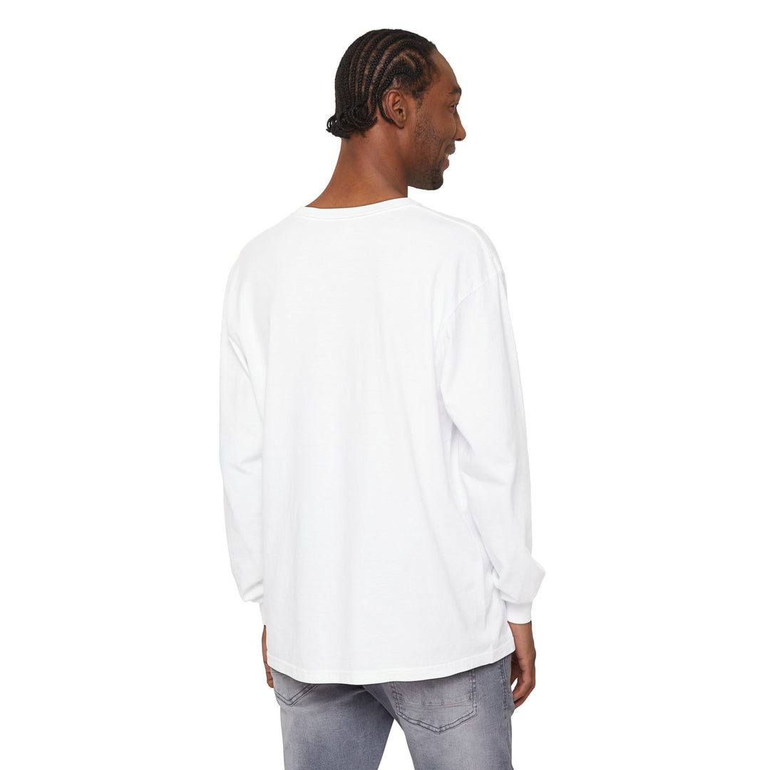 Person wearing a plain white long-sleeve shirt on a white background