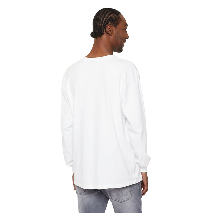 Person wearing a plain white long-sleeve shirt on a white background