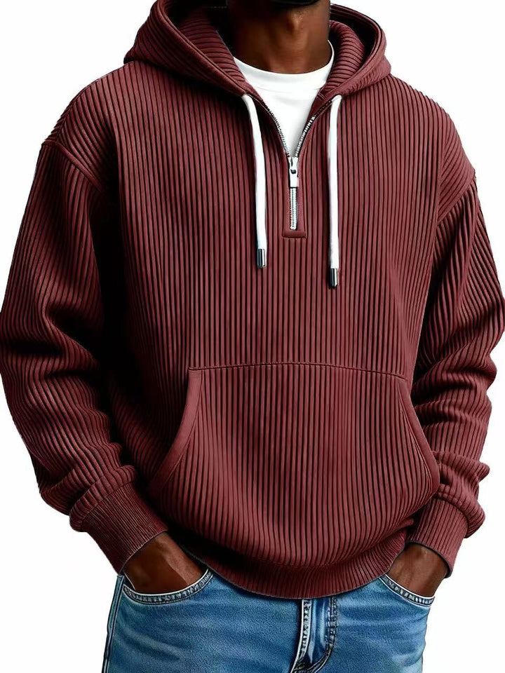 Maroon ribbed hoodie with a zipper on a white background