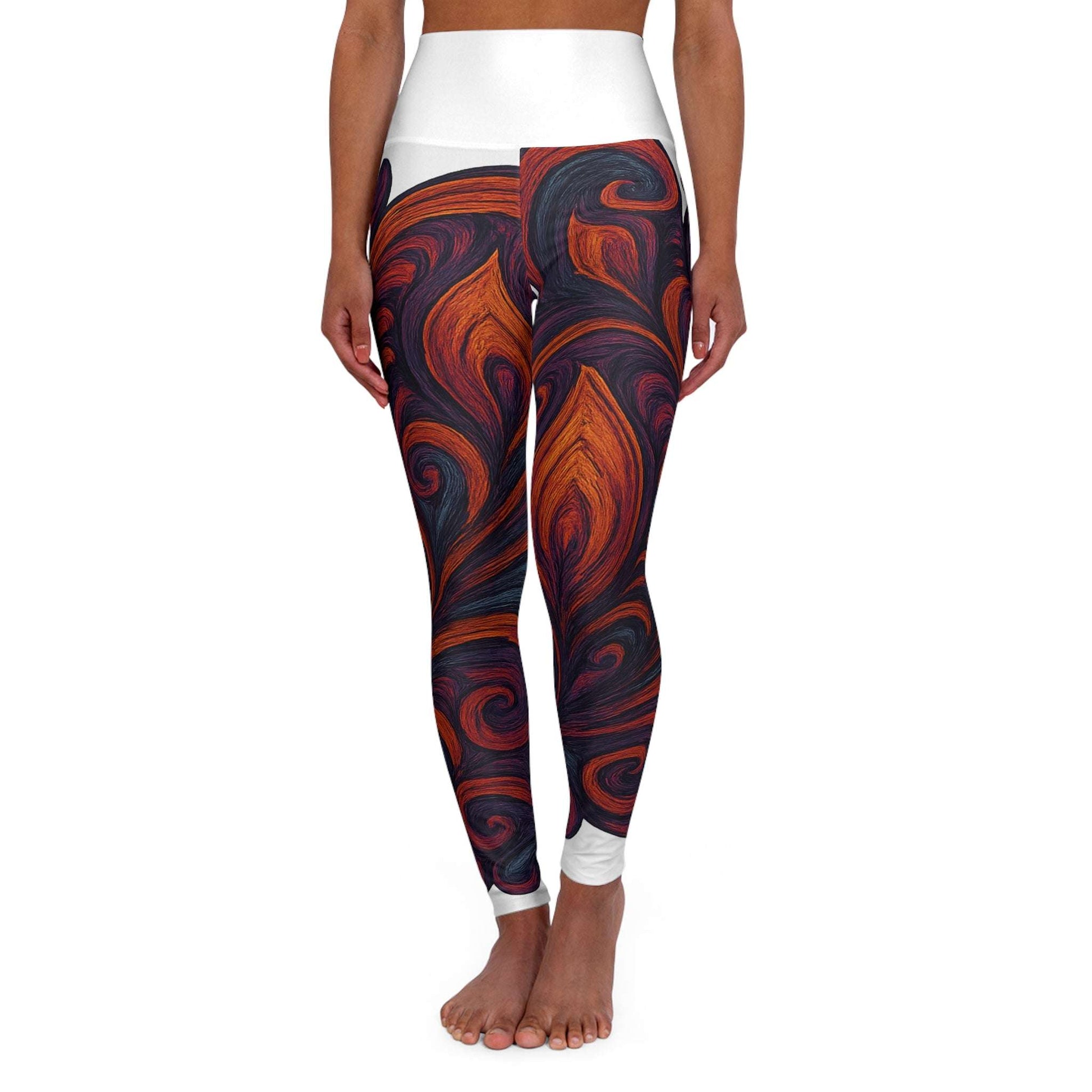 Woman in high waisted yoga leggings stretching during yoga session indoors

