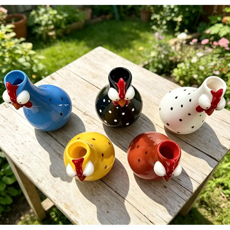 Colorful rooster accent with long neck and polka-dot design, displayed as a resin vase for flowers and standalone home decor.