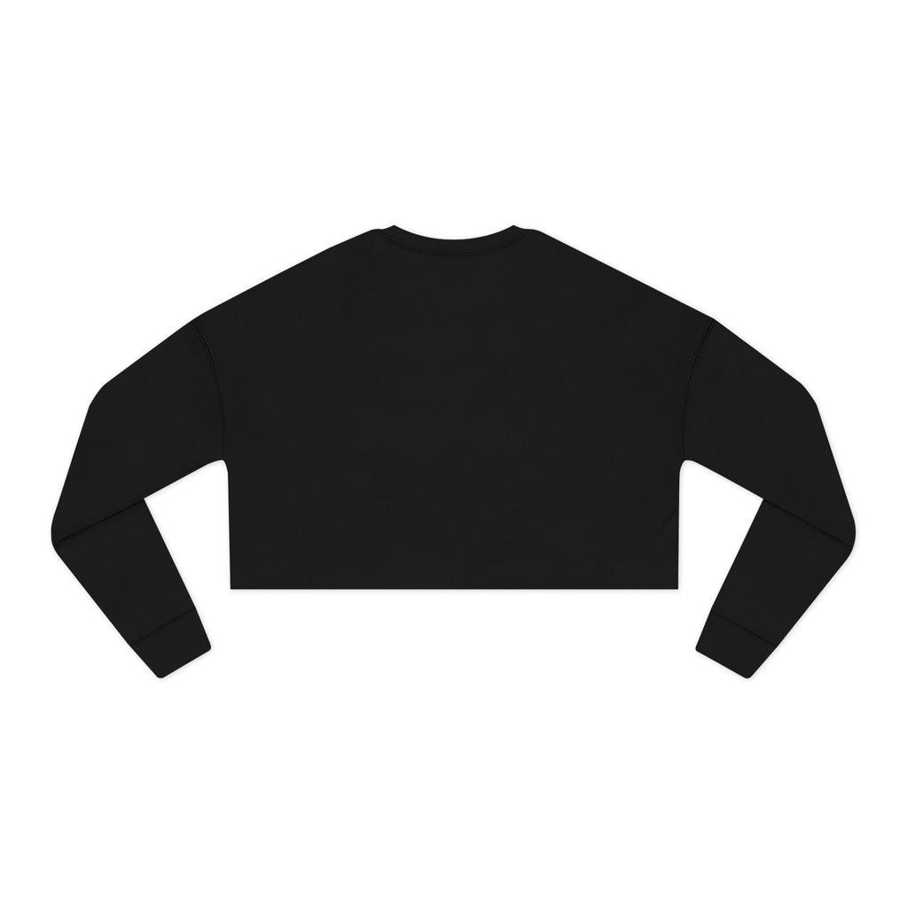 Beige cropped sweatshirt close-up highlighting the raw bottom edge and ribbed neckline.

