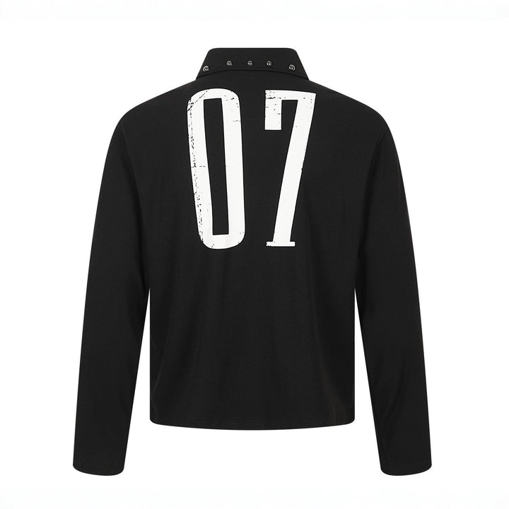 Rear view of this black printed long sleeve polo, showing the large white 07 artwork and silver studs across the back collar.