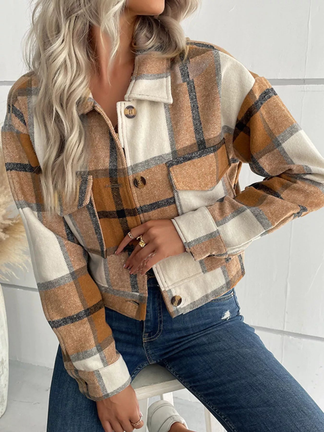Close-Up of Buttoned Plaid Crop Jacket Pockets – Textured Plaid Detail 