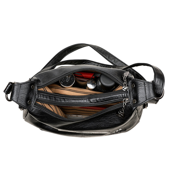 Close-Up of Soft Leather Shoulder Bag Texture – Women&