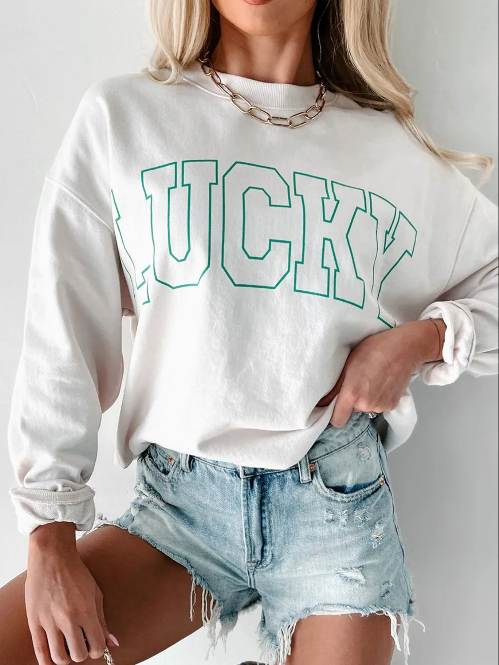 Close-up of LUCKY print on round neck sweatshirt

