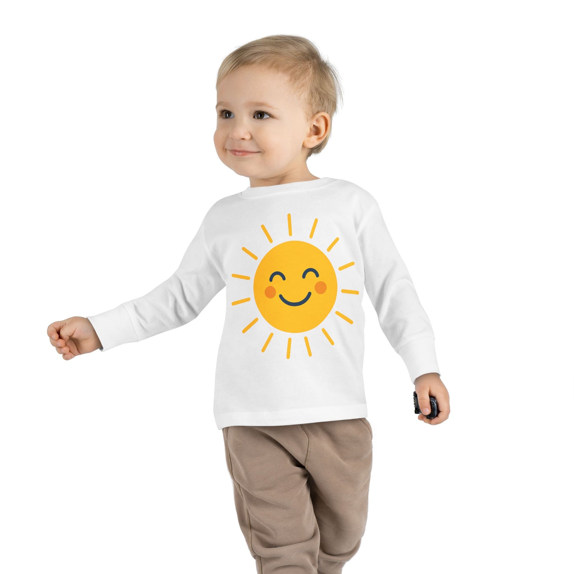 Close-up of the sun design on the Sunny Smile Toddler Long Sleeve Tee, perfect for gifting at birthdays

