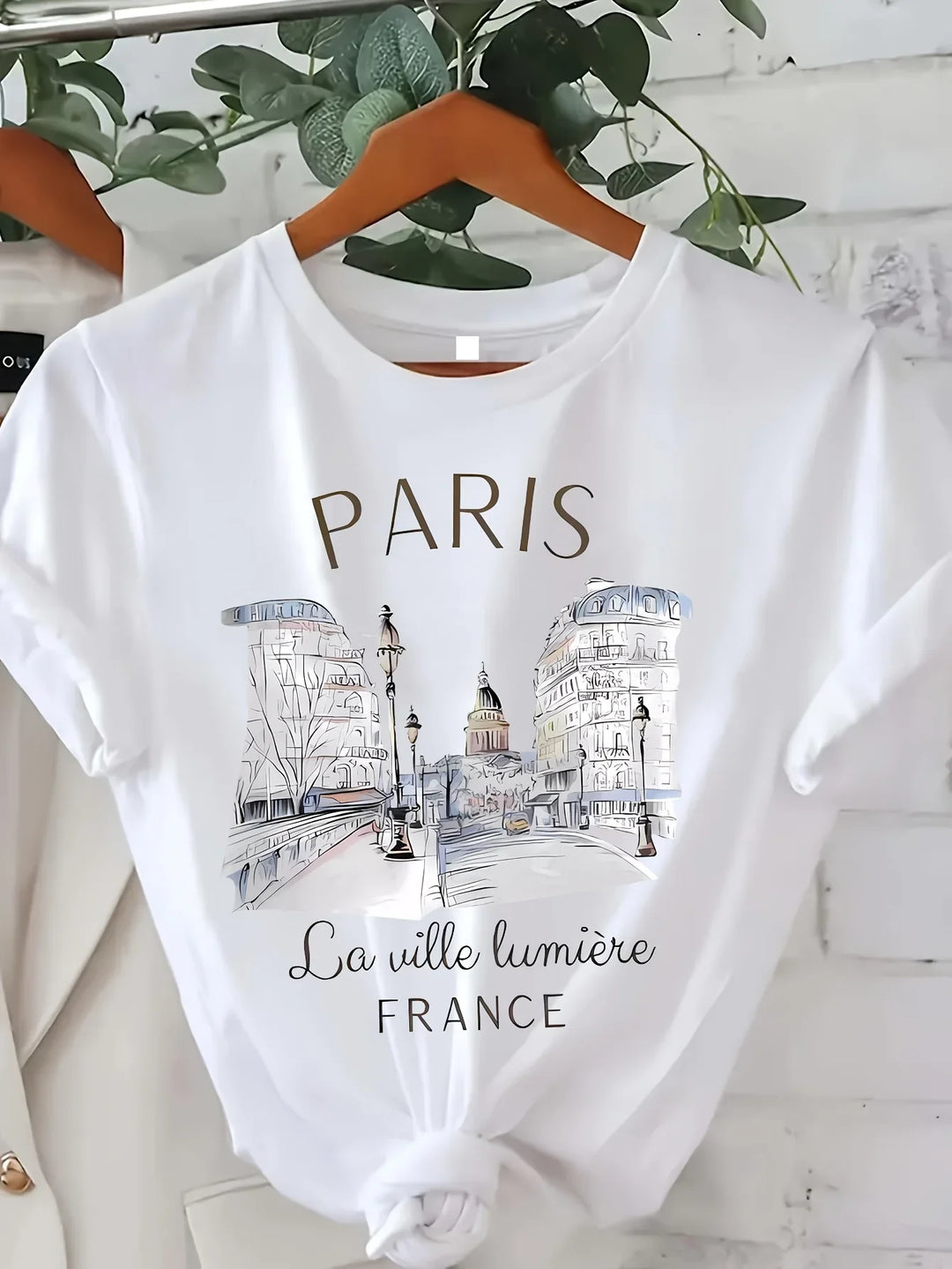 Close-up print detail on Paris T Shirt – soft knit, vivid letter graphic
