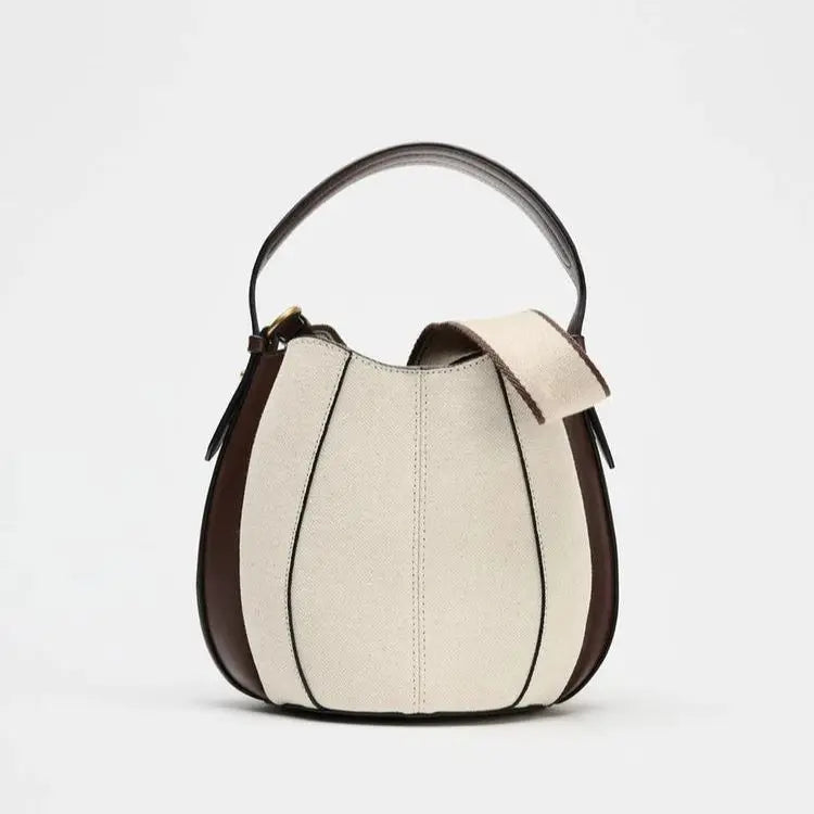 Compact bucket bag – 24×18×13.5 cm profile
