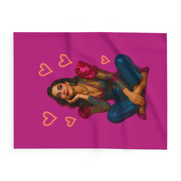 Couple sharing an Arctic Fleece Blanket on movie night - warm smiles