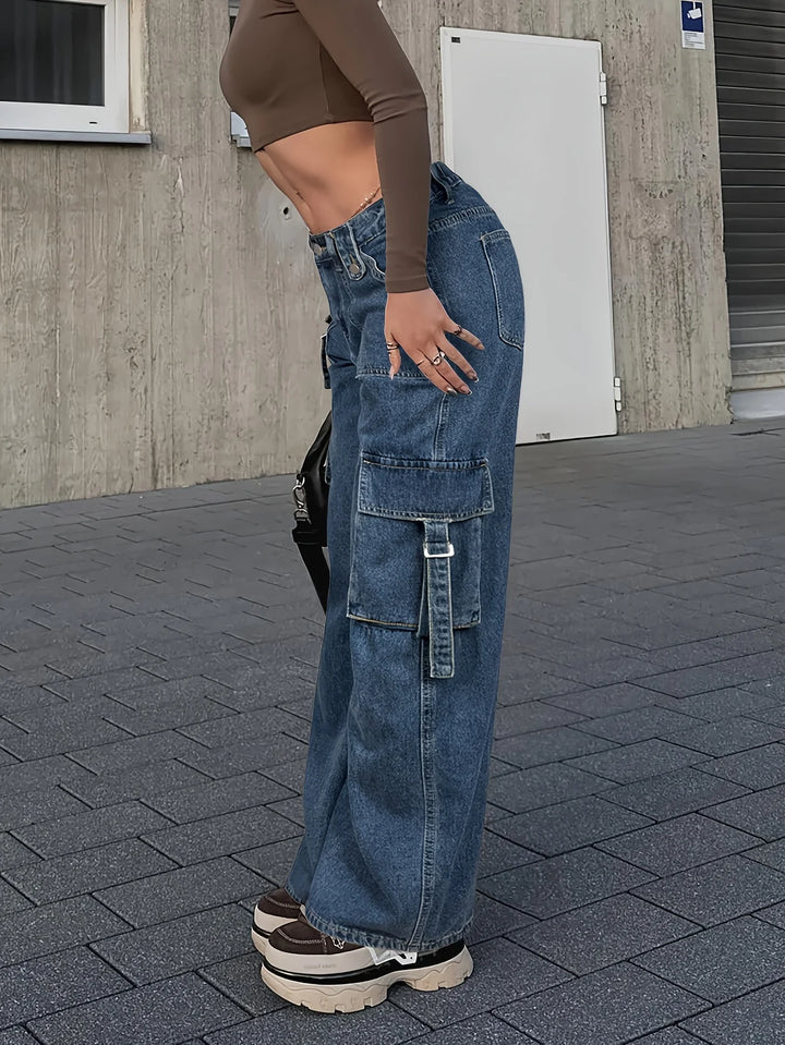 Detail Shot of Button Fly and Washed Denim in Trendy Women&