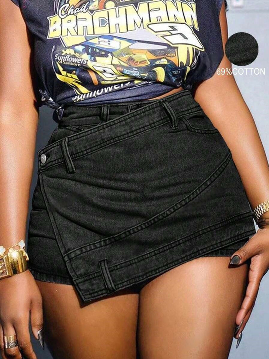 “Detail of asymmetric hem on punk-inspired denim skorts for Halloween vibes”

