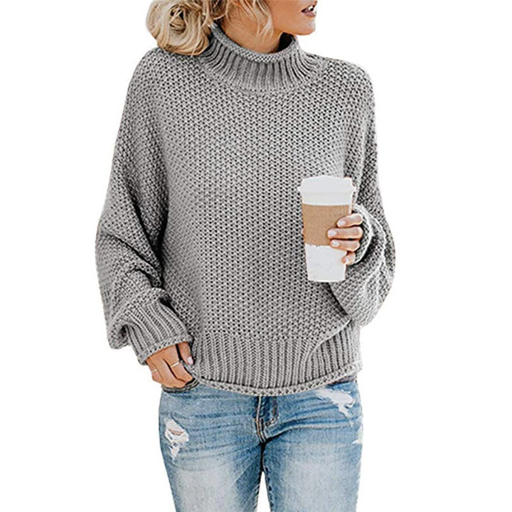 Detail shot – cuffs and hem of turtleneck pullover sweater, durable knit