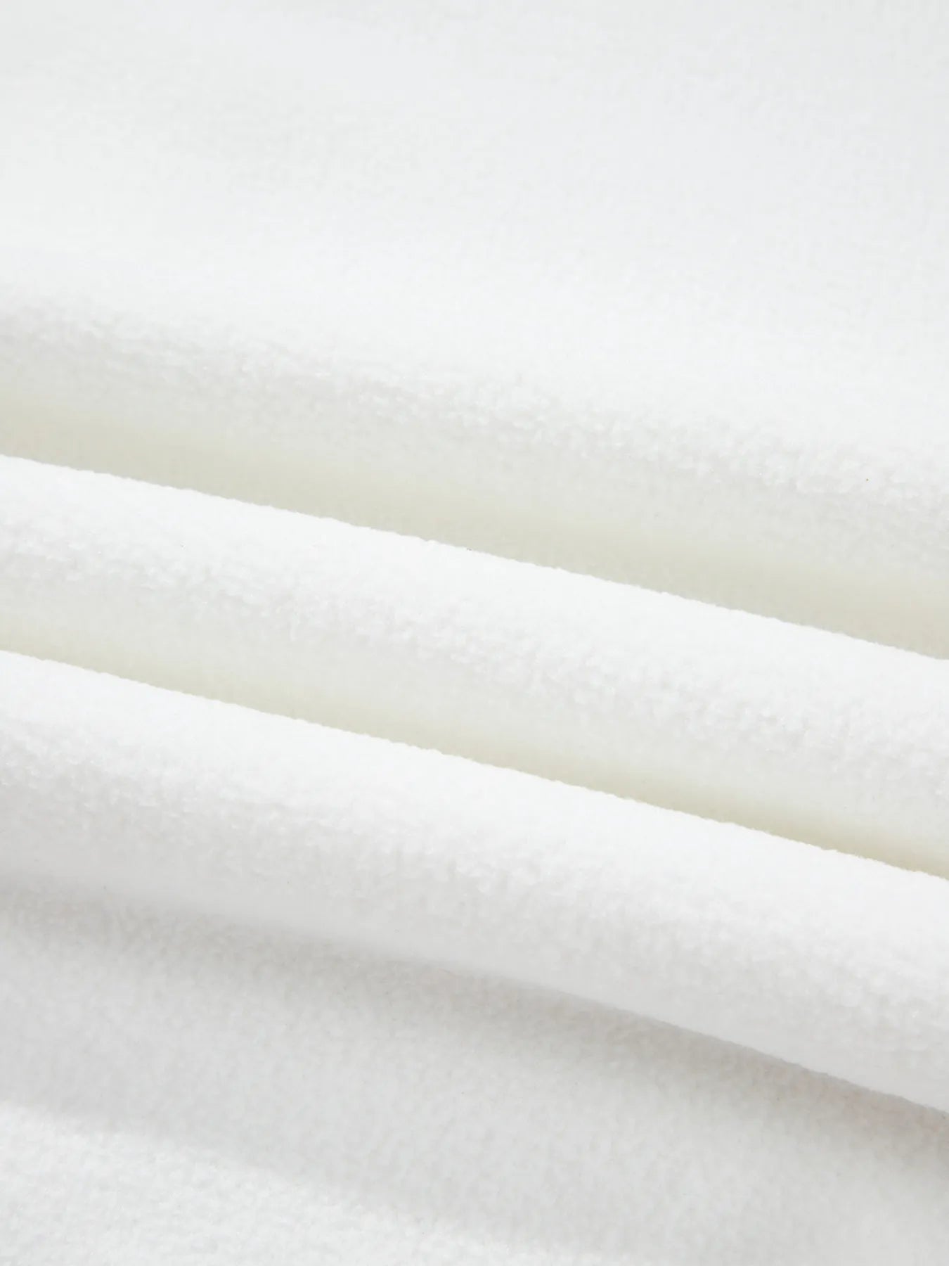 Exposed seam long sleeve top in durable polyester blend

