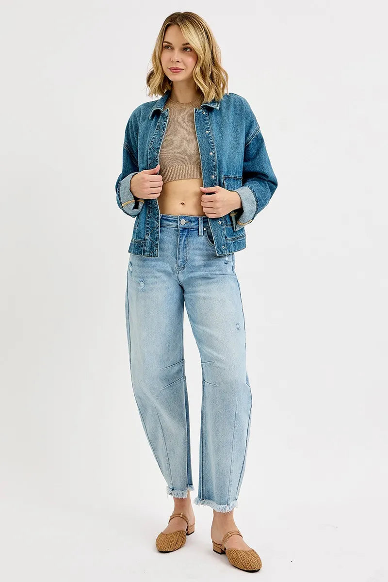 Flat lay of RISEN denim jacket with styling accessories

